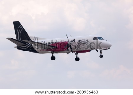FORT LAUDERDALE, USA - May 24, 2015: A Silver Airways Saab 340B plus aircraft. Silver Airways is a U.S. Airline operating around 150 daily scheduled flights.