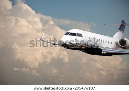 Close up of a private jet flying