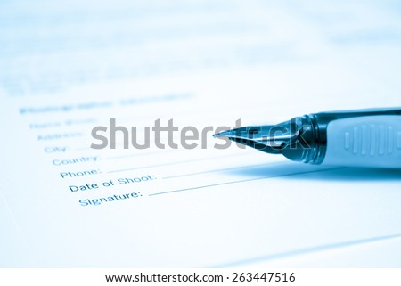 Pen and legal document for signature.Ink pen signing contract