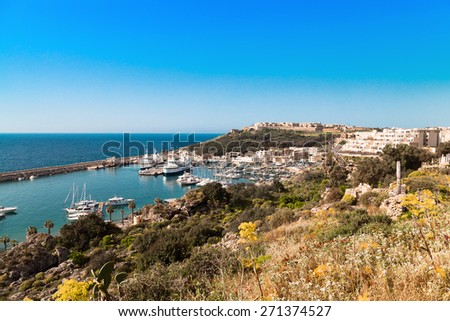 GOZO ISLAND, MALTESE ISLANDS ,EUROPE - APRIL-17, 2015. Seashore of the Gozo Island , one of the most visited island of Maltese Islands, view seen from ferry boat.