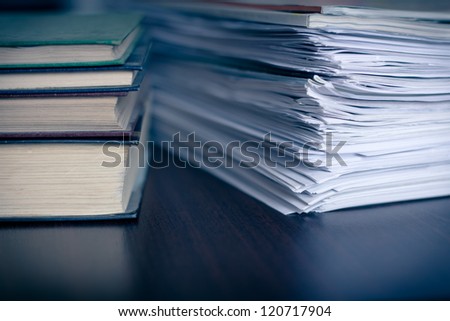 Accounting and taxes. Large pile of magazine and books closeup