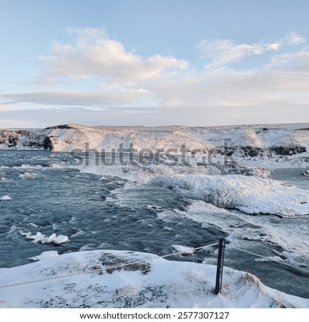 Similar – Image, Stock Photo River flowing through snowy hilly valley