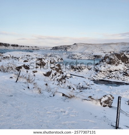 Similar – Image, Stock Photo River flowing through snowy hilly valley