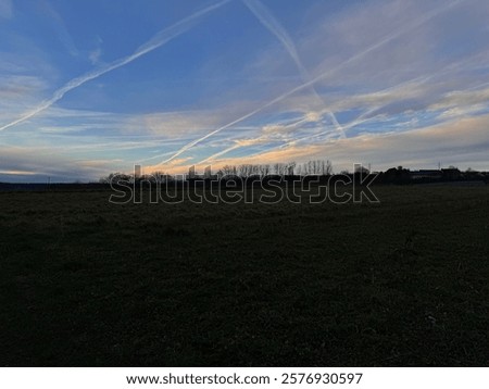 Similar – Foto Bild Ein Kondensstreifen am blauen Himmel und Äste eines blühenden Kirschbaumes lassen von der nächsten Urlaubsreise träumen / Frühling / Urlaubsplanung