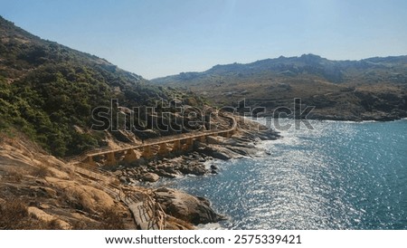 Similar – Image, Stock Photo Rocky coast among tranquil ocean water in sunny day