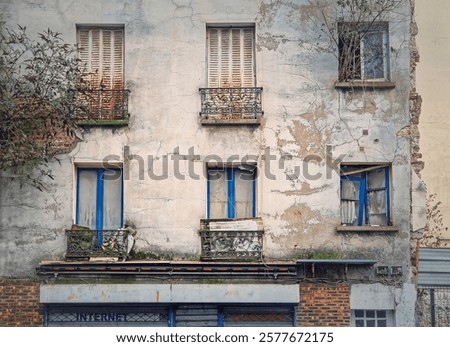 Similar – Foto Bild heruntergekommenes Haus, das aus Pflanzen wächst