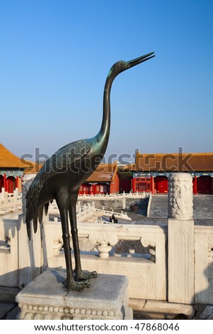 Forbidden City in Beijing The ancient bronze crane is placed outside the Hall of Supreme Harmony, next to bronze turtle.