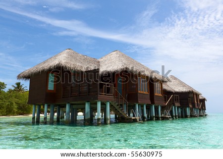 Water Villas in the Ocean. Welcome to the Paradise! Maldives. High Contrast.