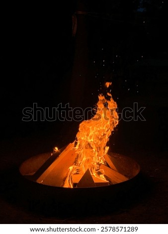 Image, Stock Photo Flames leap up, the heat distorts the view on the tree in the background