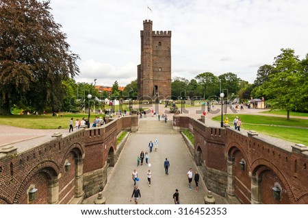 HELSINGBORG, SWEDEN - AUGUST -30: Castle walls view for The Core tower with tourists in Helsingborg on August 30, 2015. The Core is a part of larger Danish fortress build in 1310 year.
