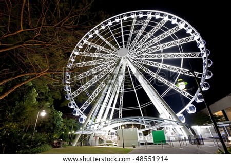 Sky wheel illuminated at night