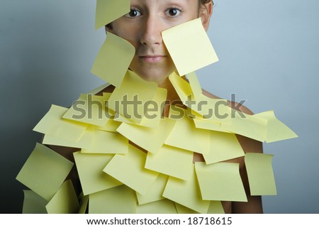 A portrait of a boy with yellow notes on body