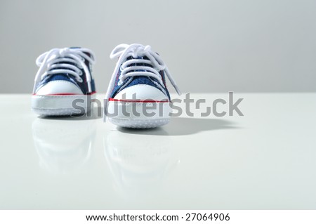Kids sport shoes on white background, top view