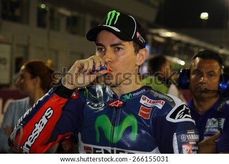 LOSAIL - QATAR, MARCH 29: Spanish Yamaha rider Jorge Lorenzo on the grid at 2015 Commercial Bank MotoGP of Qatar at Losail circuit on March 29, 2015