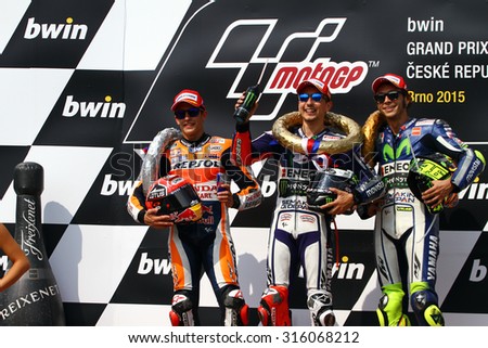 BRNO - CZECH REPUBLIC, AUGUST 16: The three winning riders on the podium at 2015 MotoGP of Czech Republic at Brno circuit on August 16, 2015