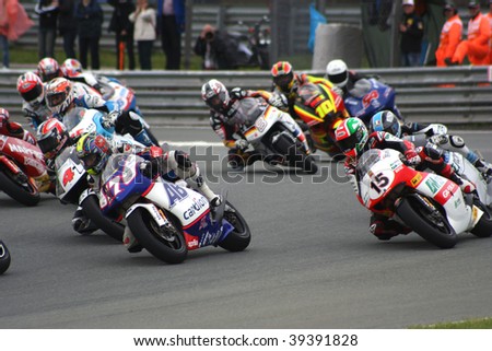 SACHSENRING, GERMANY - JULY 19: Czech rider Karel Abraham fighting with other riders in the first corner of 2009 Alice German Motorcycle GP at Sachsenring , Germany