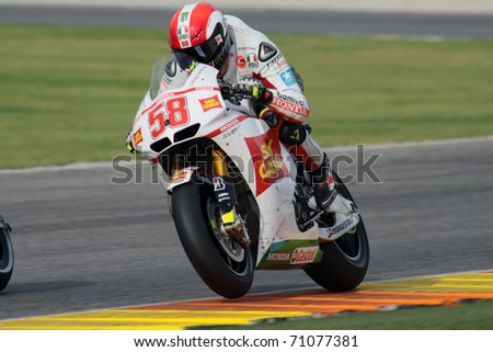 VALENCIA, SPAIN - NOVEMBER 7: Italian rider Marco Simoncelli pushes hard during race at Generali Moto GP of Valencia on November 7 , 2010