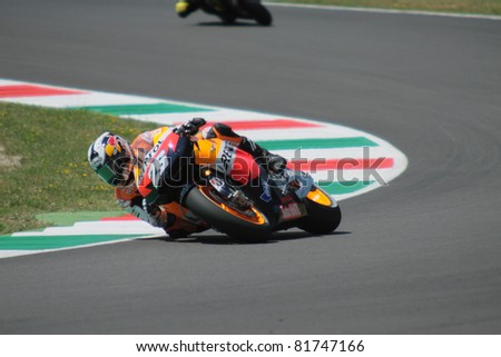 MUGELLO - ITALY, JULY3: Spanish Honda rider Dani Pedrosa pushes hard at 2011 TIM MotoGP of Italy on July 3, 2011