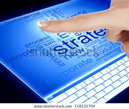 Finger touching a blue computer screen with word on it