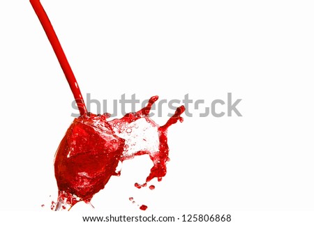 the red Juice splash isolated on white