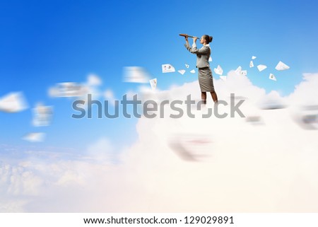 Image of businesswoman looking in telescope standing atop of cloud