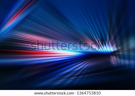 abstract dark background of light with stripes of colourful rays moving from the center