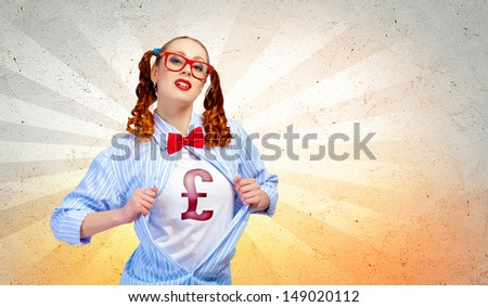 Young woman acting like super hero with pound sign on chest