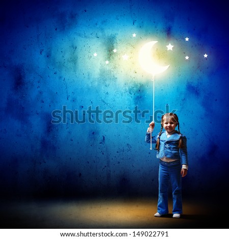 Image of little cute girl with moon on rope