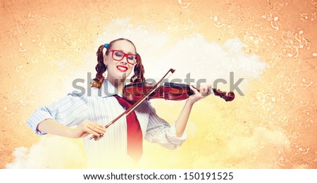 Image of young funny woman with violin against color background
