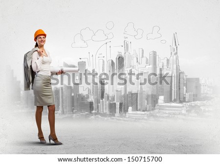 Image of woman engineer in helmet with drafts. Construction concept