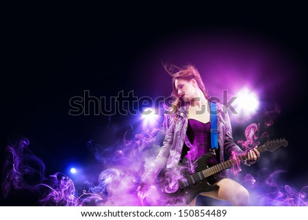 Rock passionate girl with black wings and lights
