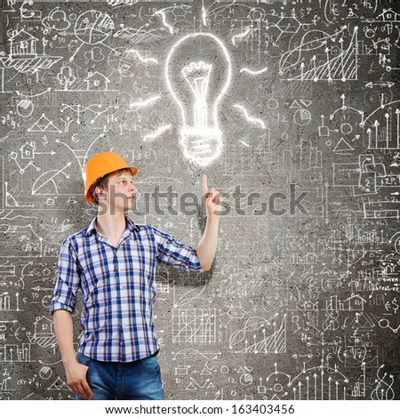 Image of man engineer against building project sketch. Idea concept