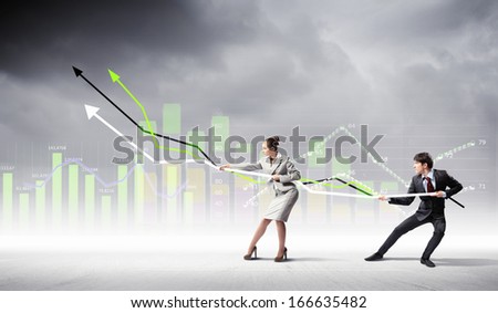 Image of young businesspeople pulling graph. Chart growth concept