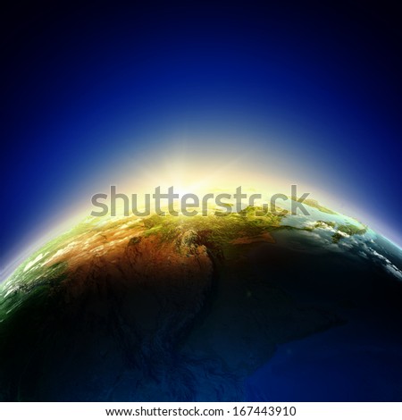 Sun rising above Earth planet. Conceptual photo. Elements of this image are furnished by NASA