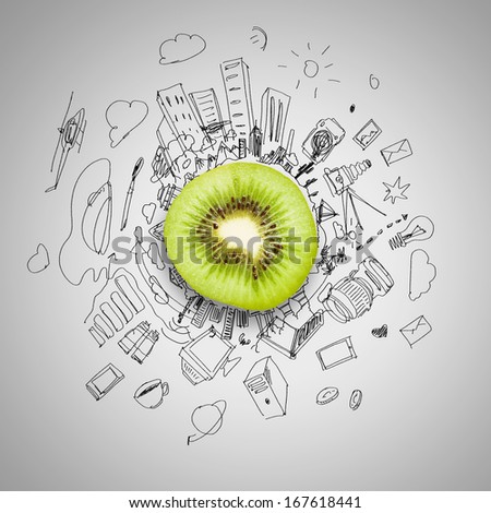 Kiwi half against background with business sketches