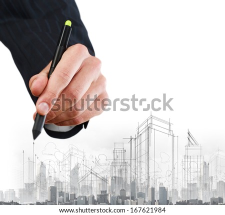 Close up of businessman hand drawing sketches of buildings