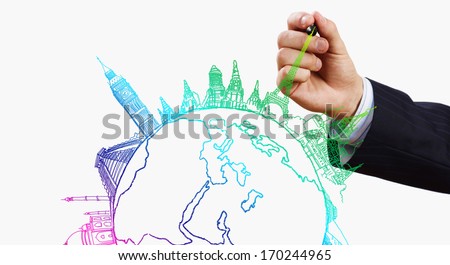 Close up of businessman drawing Earth planet