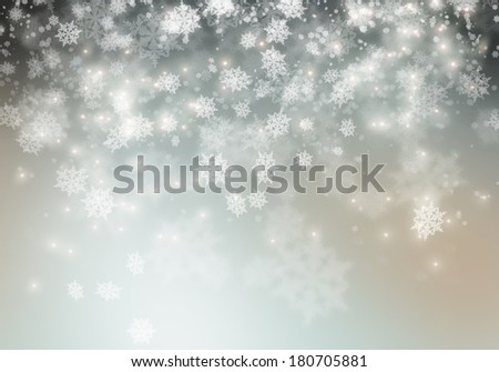 Conceptual image with snowflakes on silver background