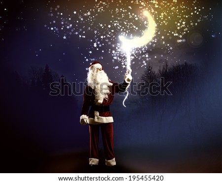 Santa Clause in red costume against blue background