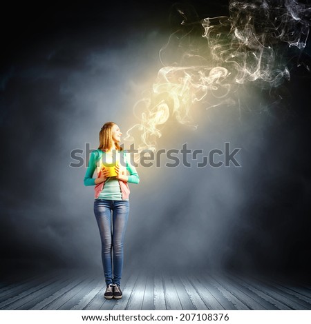 Young girl holding bucket with flying out fume