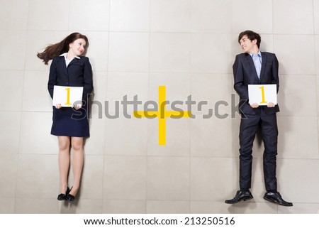 Businessman and businesswoman holding banners. Partnership concept