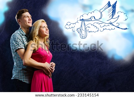 Young happy couple dreaming about family and future life