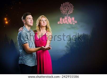 Young happy couple hugging each other and dreaming about future
