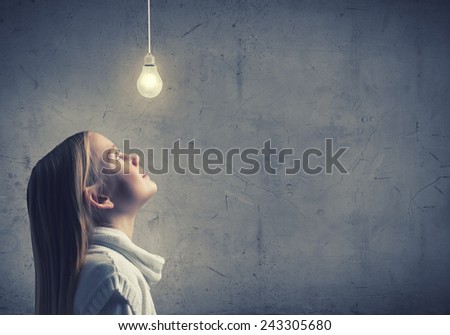 Young thoughtful girl of school age with closed eyes