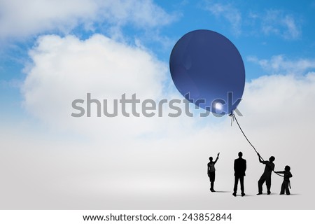Little silhouettes of people pulling rope with balloon