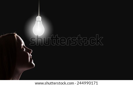 Young thoughtful girl of school age with closed eyes