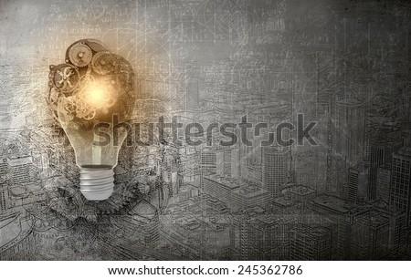 Close up of light bulb and gears mechanism