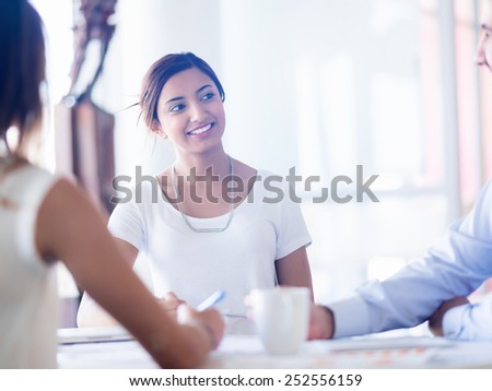 Team having a discussion in office