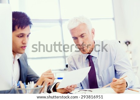 Two businessman in office having discussion