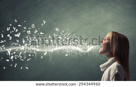 Side view of girl of school age and voice coming out of her mouth